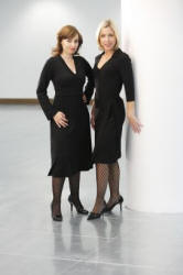 petite Affair - The dark haired model wears the Annette Black Dress sizes XS - XL �75, and the blonde model wears the Classic Wrap Black Dress sizes 6-16 at �49.  